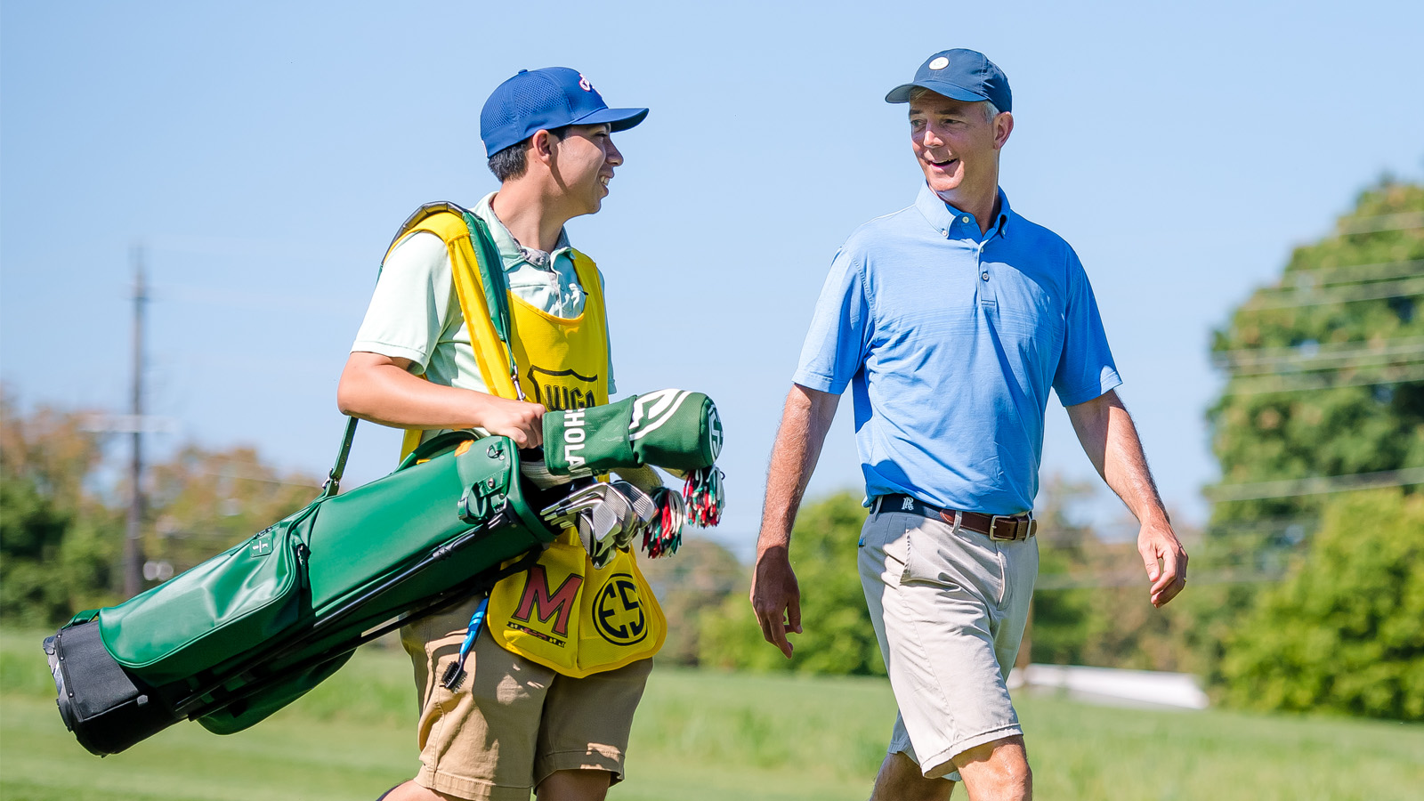 Caddie and golfer